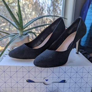 Black suede pumps